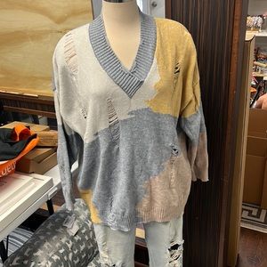Distressed sweater